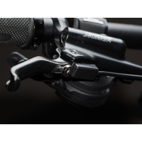 Contact magnétique pour frein hydraulique